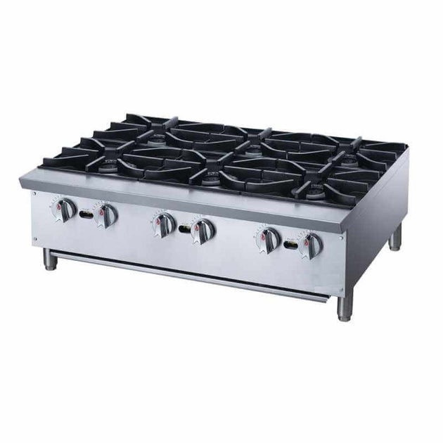 a stainless steel stove with four burners