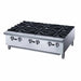 a stainless steel stove with four burners