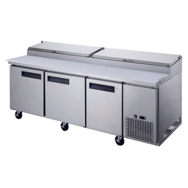 a stainless steel counter with three doors and two drawers