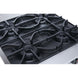 a close up of a gas stove with four burners
