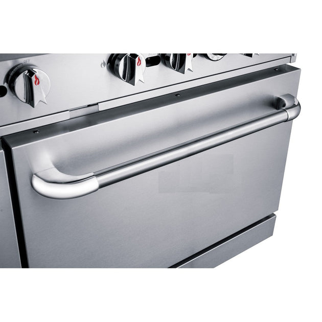 a stainless steel stove top oven with two burners