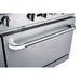 a stainless steel stove top oven with two burners