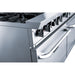 a stainless steel stove top oven with four burners